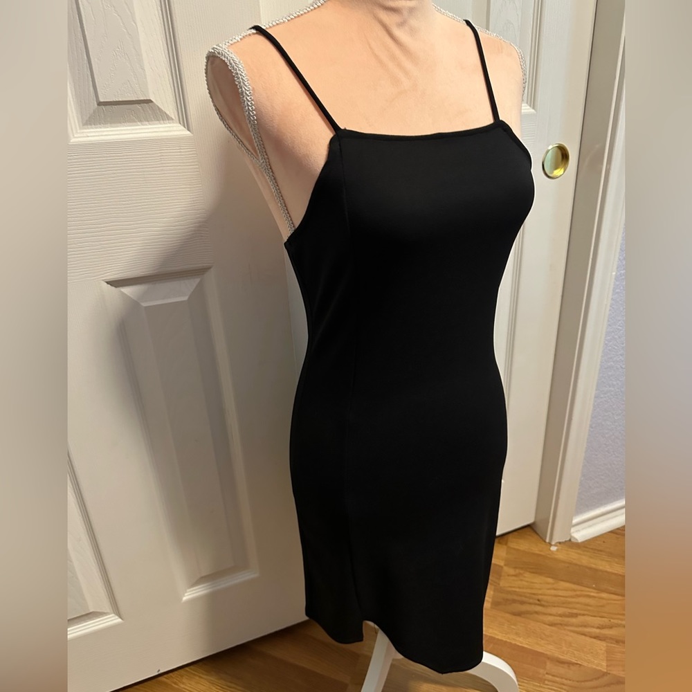 Little black Dress with unique knocked hem